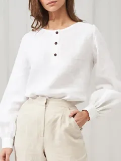 Blusa con botones y mangas farol unicolor