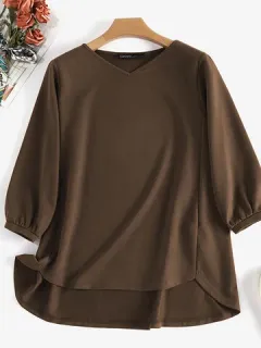 Blusa de punto con cuello en V unicolor