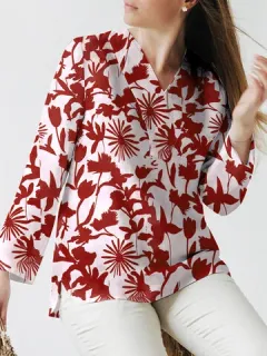 Blusa con abertura y estampado de plantas por toda la prenda