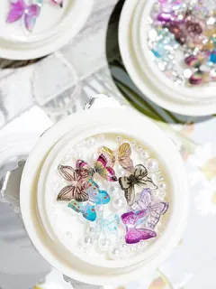 Pequeña joyería de mariposa Uña